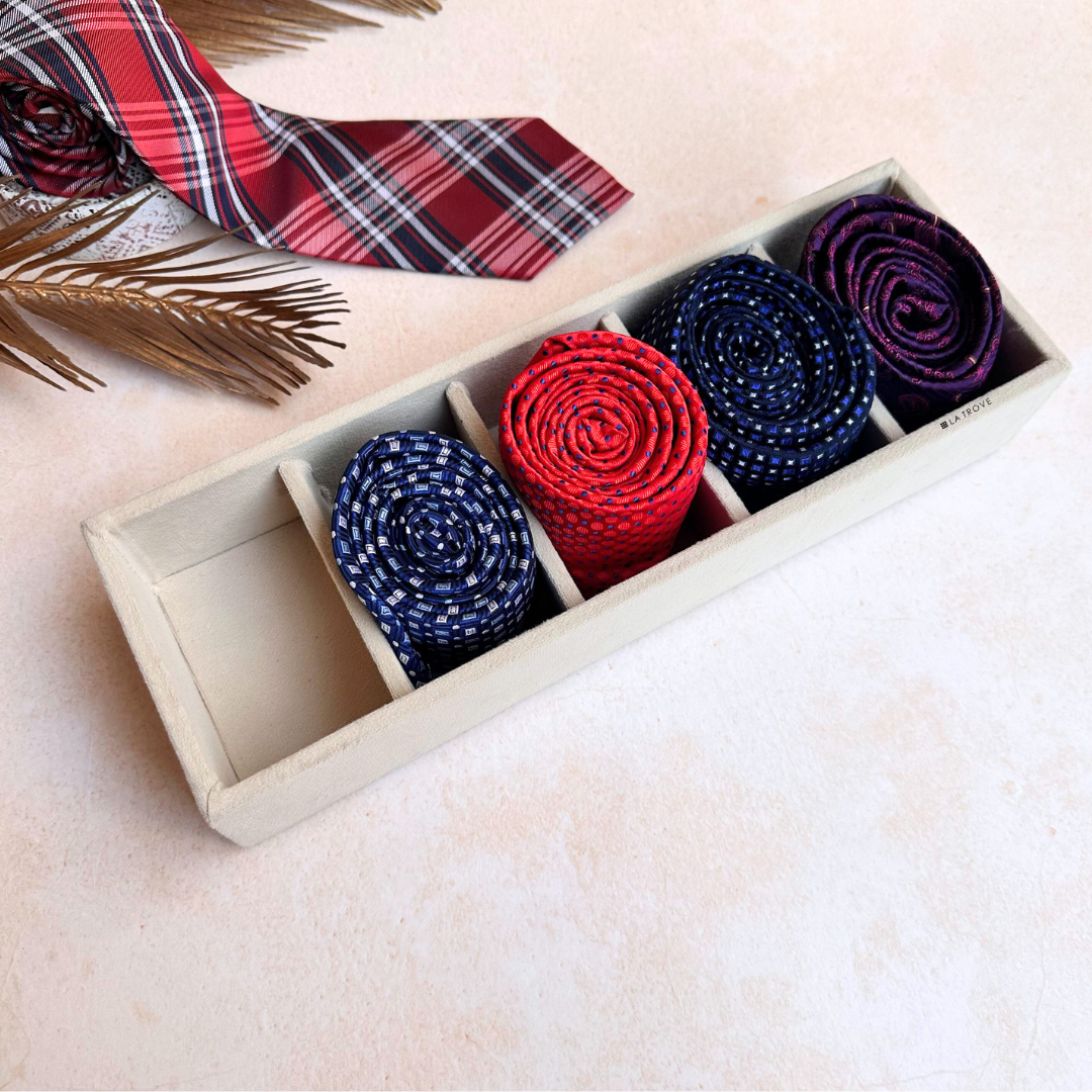 Cream velvet 5-slot tie organizer tray for accessories.